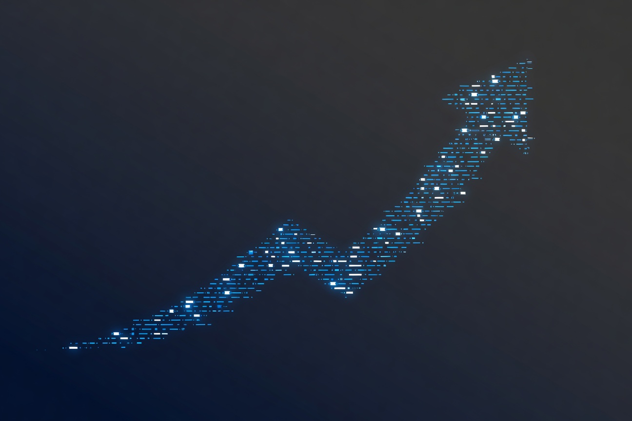 Abstract upward-trending curve made of glowing code fragments and data points rising against a dark background, representing exponential developer growth