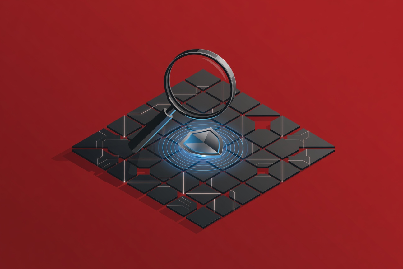 A magnifying glass scanning glowing geometric shapes arranged in a circuit-board grid, with a shield emblem at the center